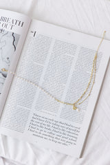 Pulled Heart Strings Necklace Gold